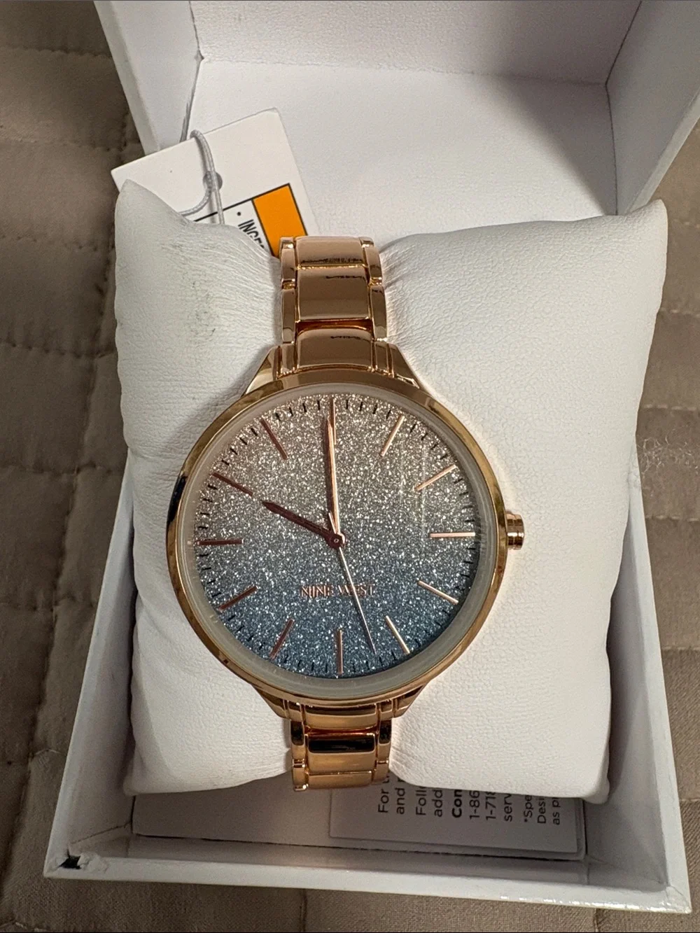Nine West  Gold Bracelet Watch with Glitter Blue Dial